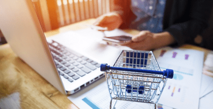 cropped-image-woman-inputting-card-information-key-phone-laptop-whileshoppingonline cropped-image-woman-inputting-card-information-key-phone-laptop-whileshoppingonline